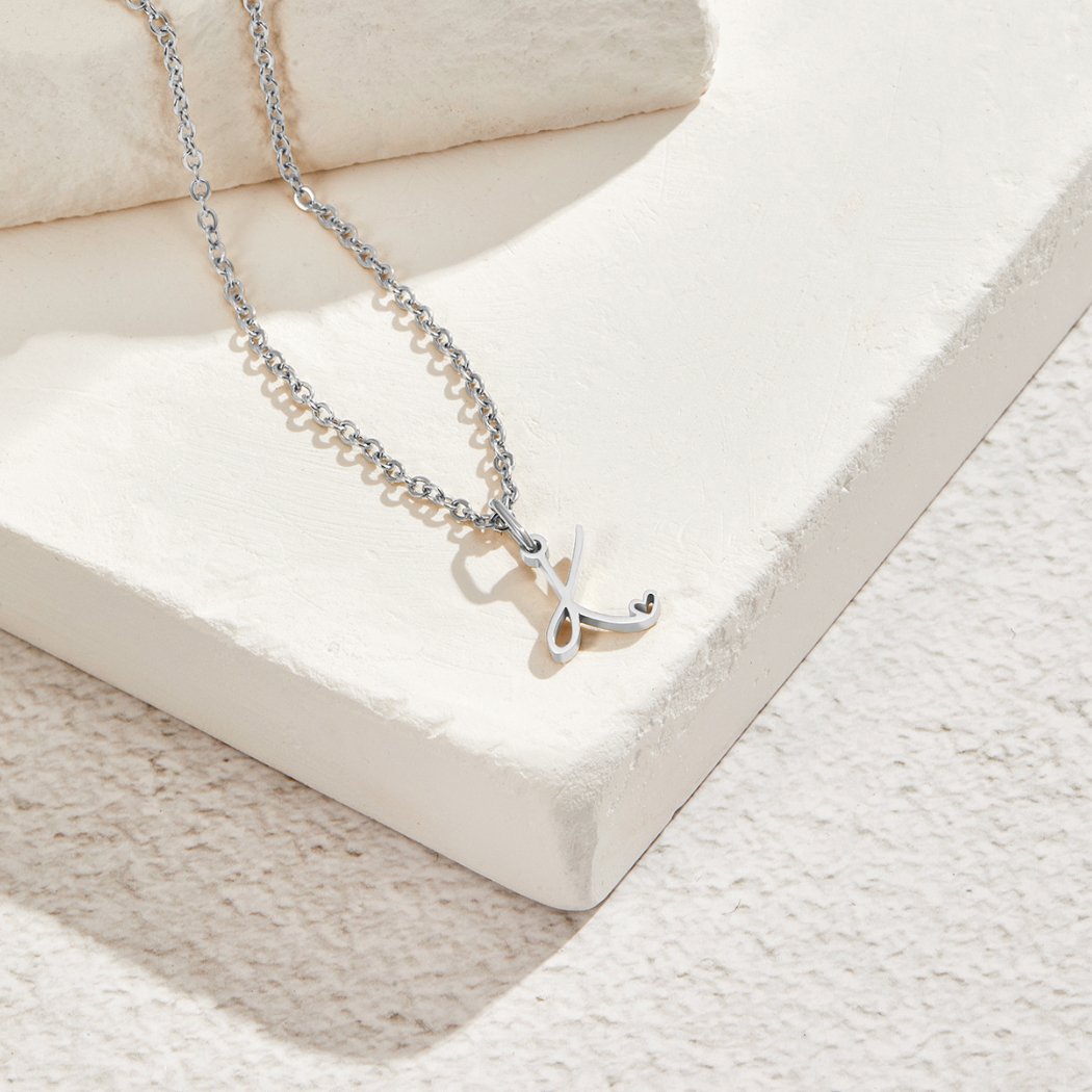 Collana con cuore e lettera in argento