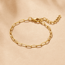 Bracciale con ciondolo a forma di graffetta in oro 18 carati
