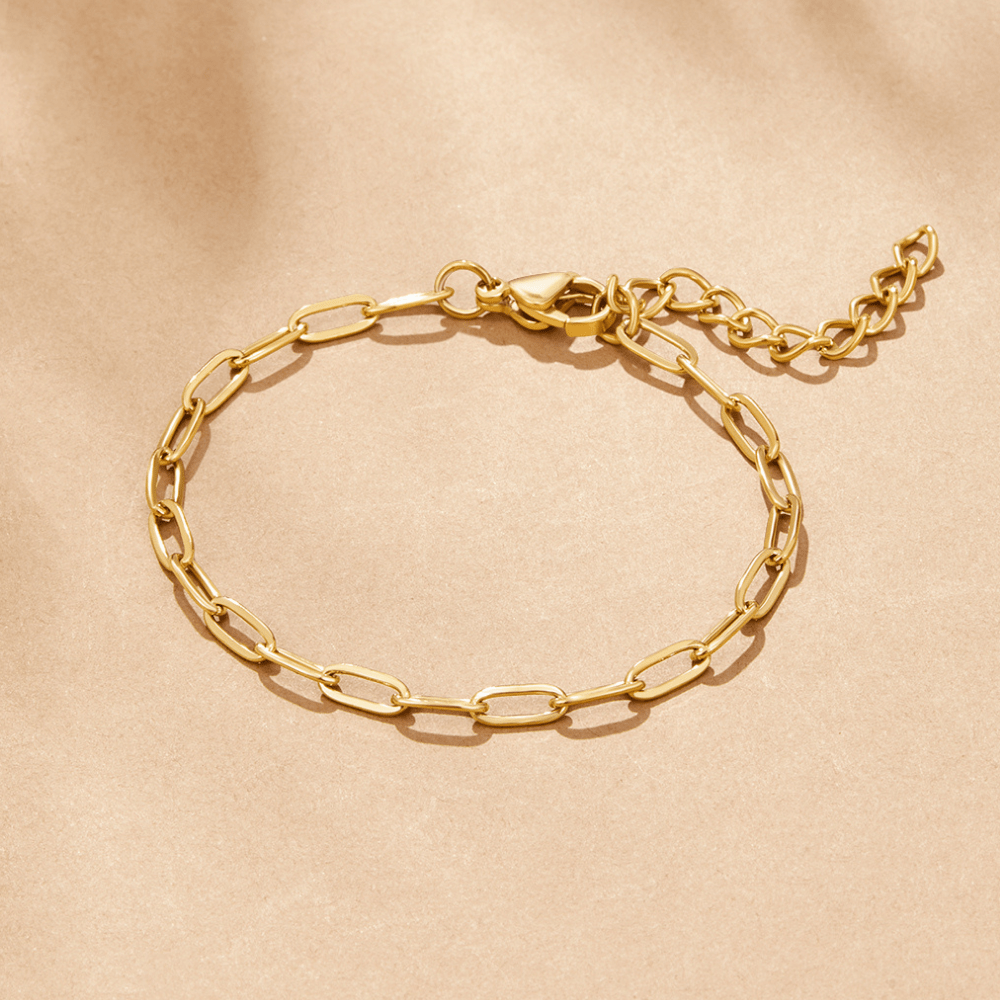 Bracciale con ciondolo a forma di graffetta in oro 18 carati