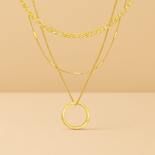 Collana con ciondolo a cerchio aperto a tre file in oro